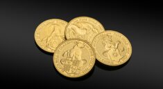 gold round coins on black surface